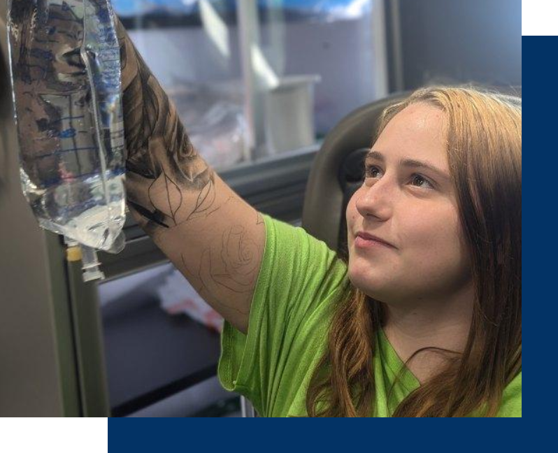 A woman holding onto a piece of paper on the side of a bus.